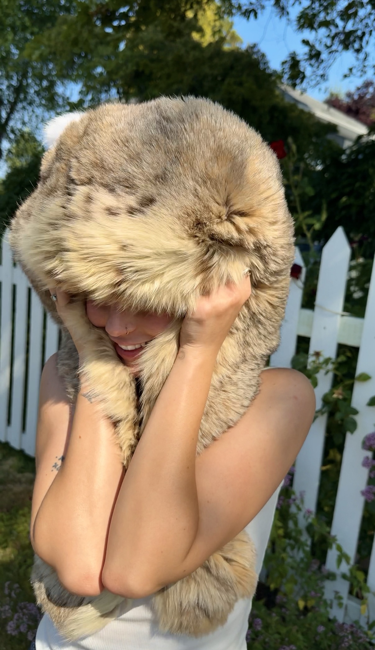 Heartwear Hats founder wearing a reclaimed fur hat