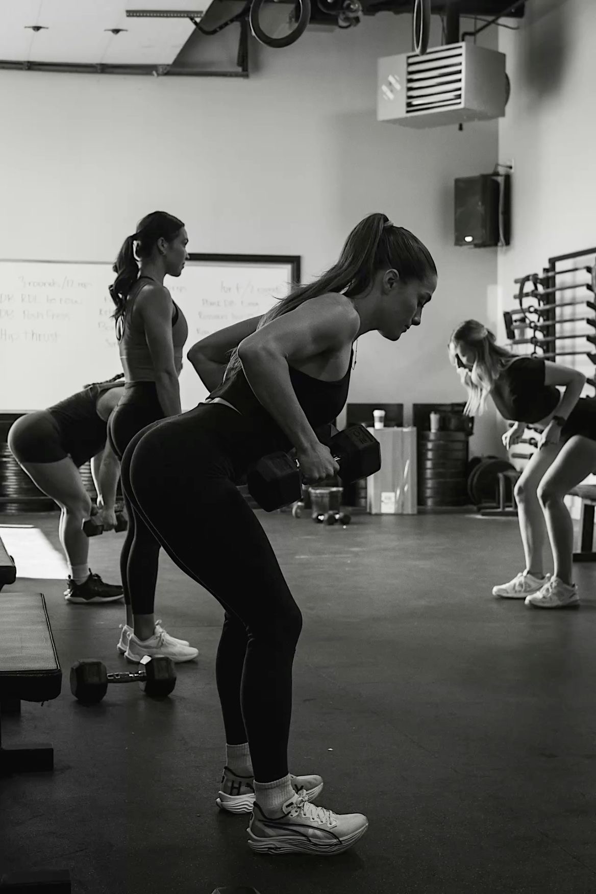 Women lifting in a gym class — Built for Women Who Lift