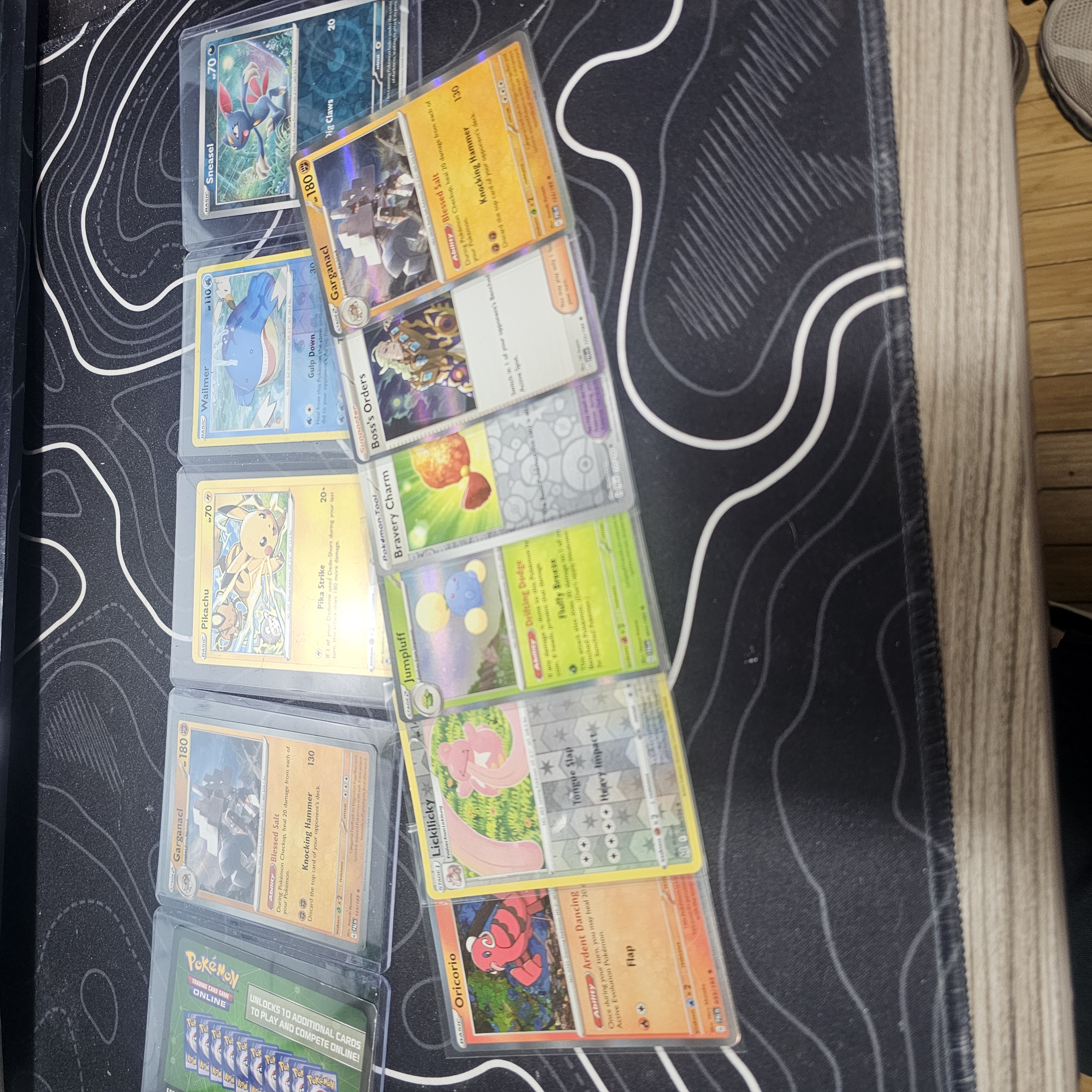 Alternate front-facing spread of collectible cards from a collector's collection