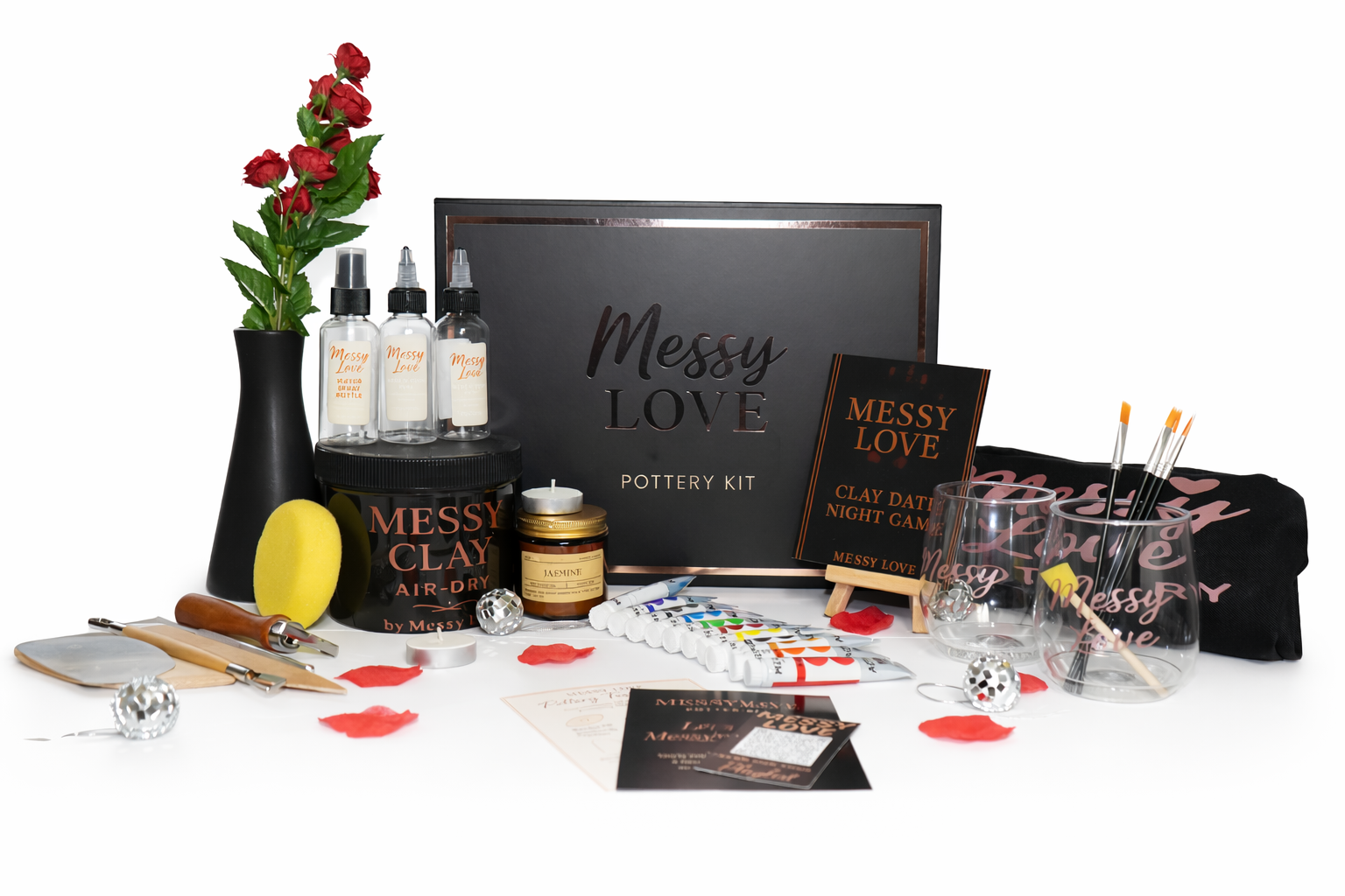 Messy Love Couples Pottery Kit with pottery supplies arranged for a hands-on date night