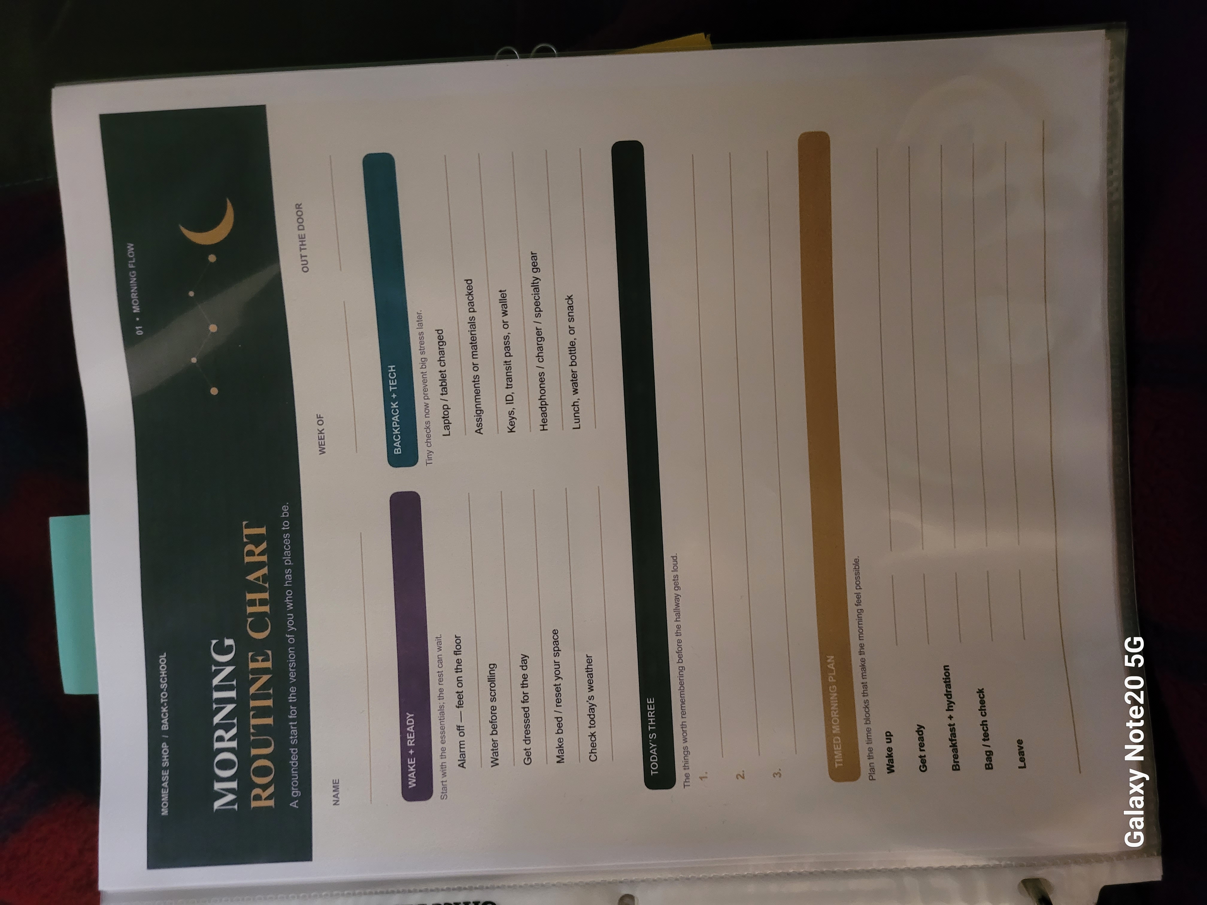 Printed teen morning routine chart in a protective sleeve with morning flow and timed plan sections