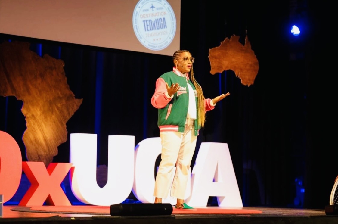 Chanda Santana speaking on the TEDxUGA stage
